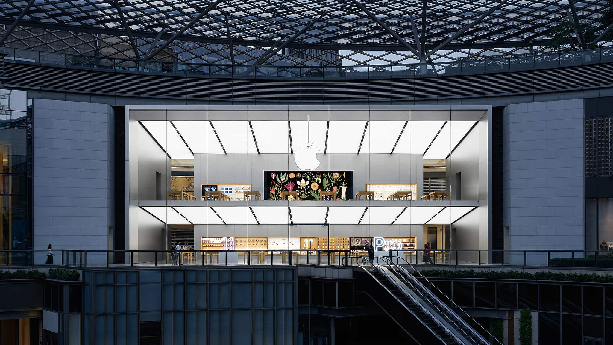 Exterior view of Apple Parc Central,  which sits above an open plaza along the center axis of the shopping mall. The store is 2-storey high featuring a 12.5 meter high store front.